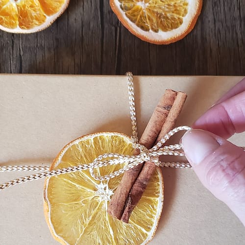 gift wrapping with dried orange slices